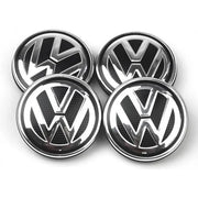 Volkswagen Kromi-Mustat 56mm Vannekeskiöt 6CD 601 171 (4kpl sarja)